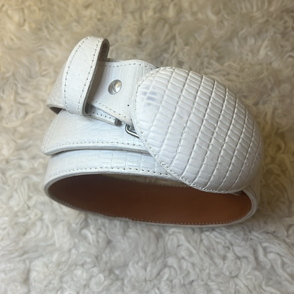 Sebastian’s white belts size 38